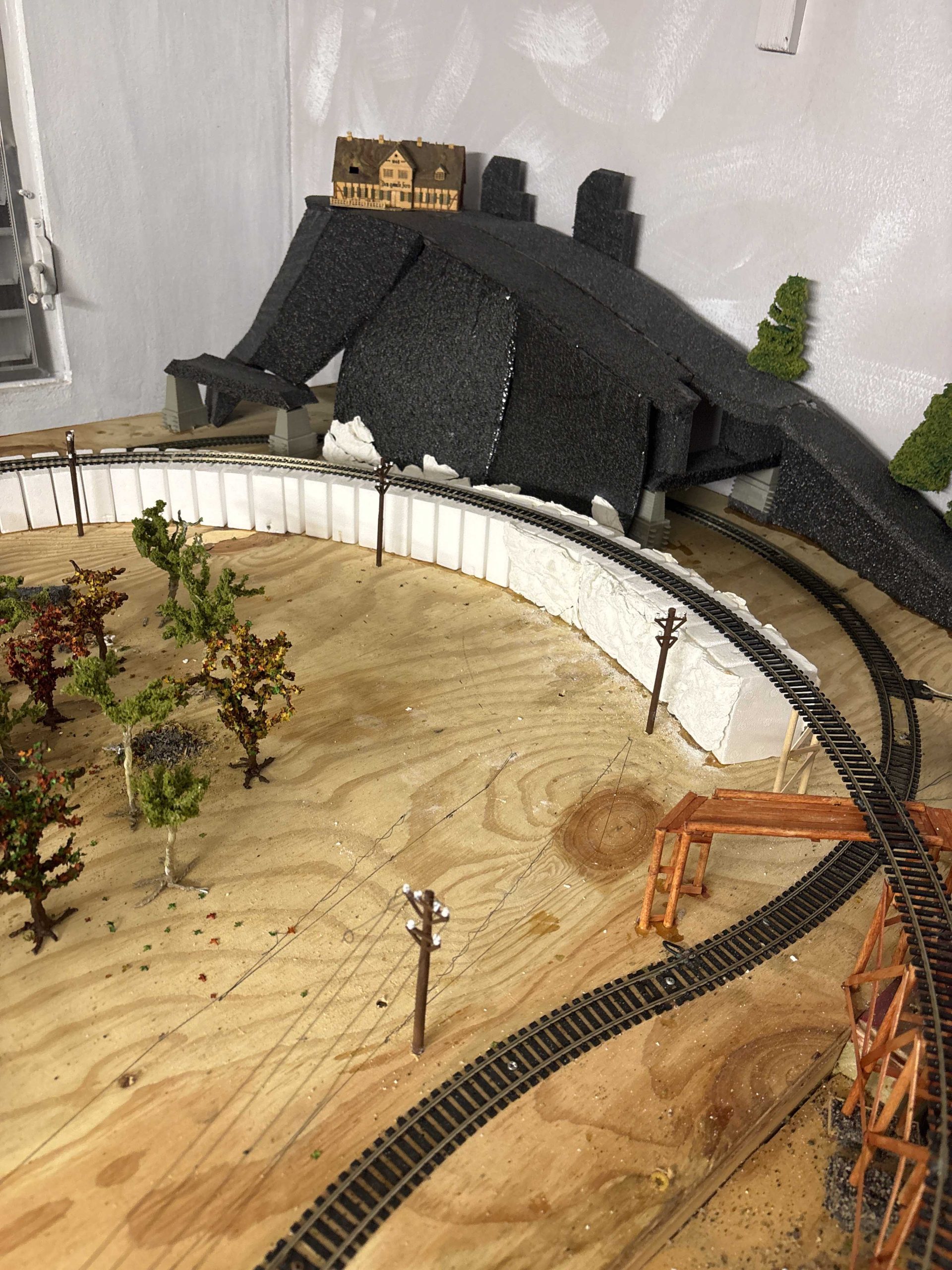 model railroad incline to bridge