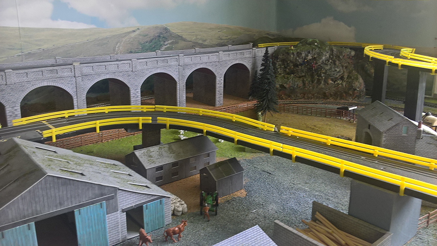 HO model train cars bridge