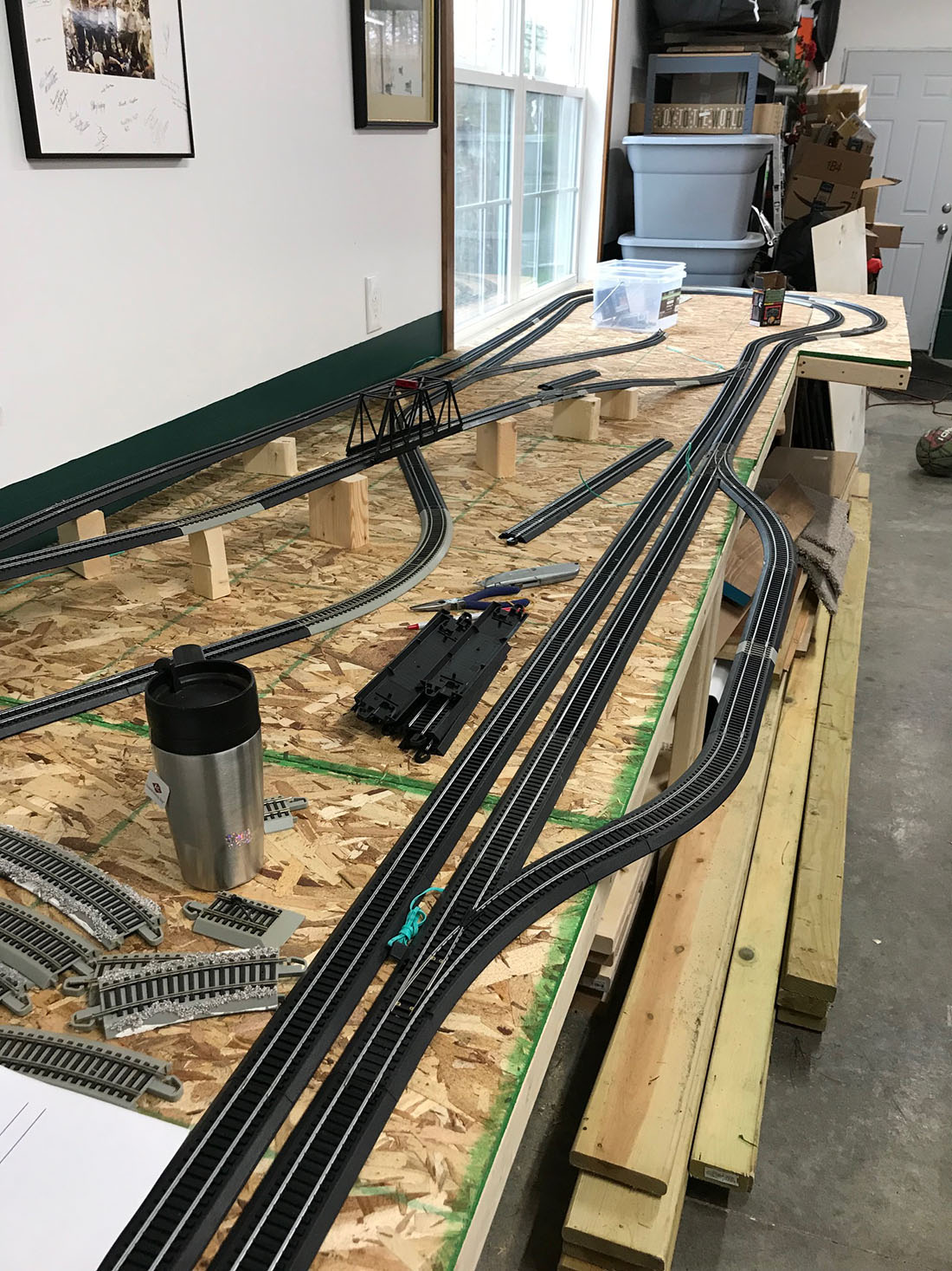 model railroad laying track for feeder wires