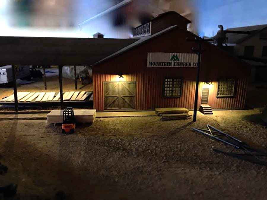 HO scale sawmill at night