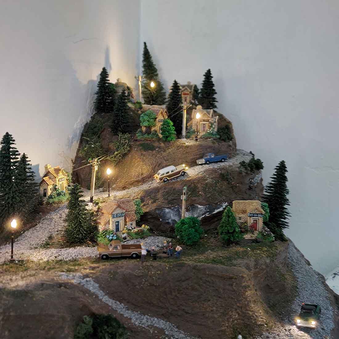 steep hill with cars model railroad