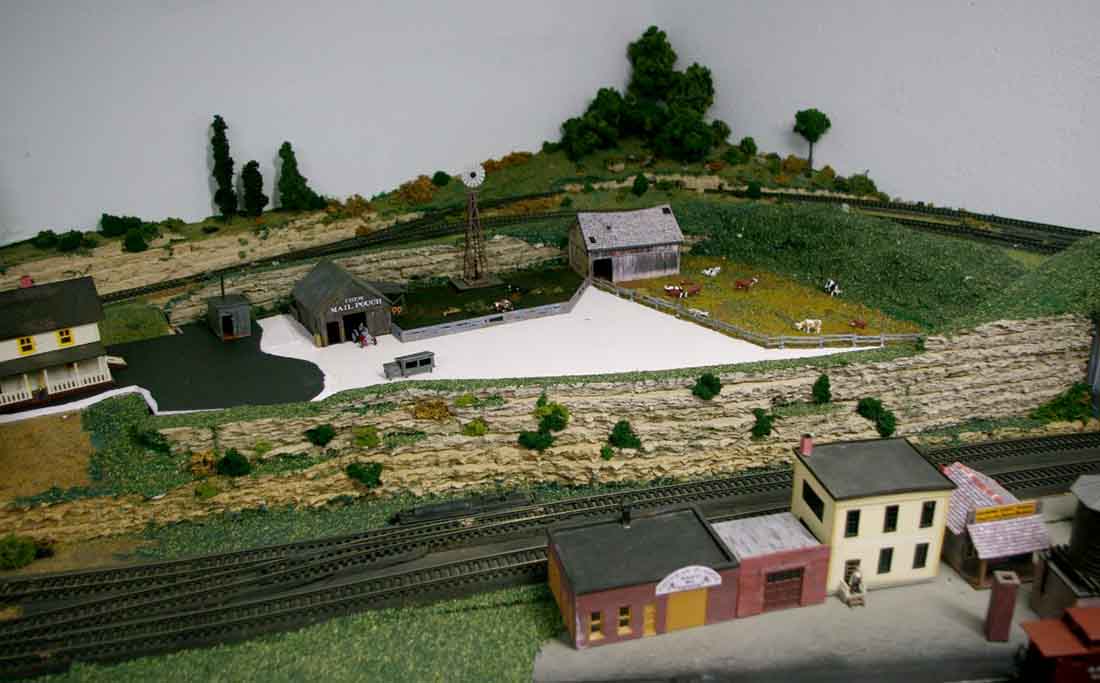 model railroad corner with scenery