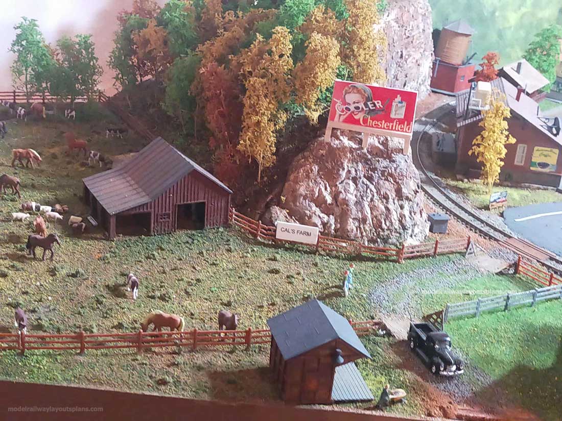 model railroad track side farm