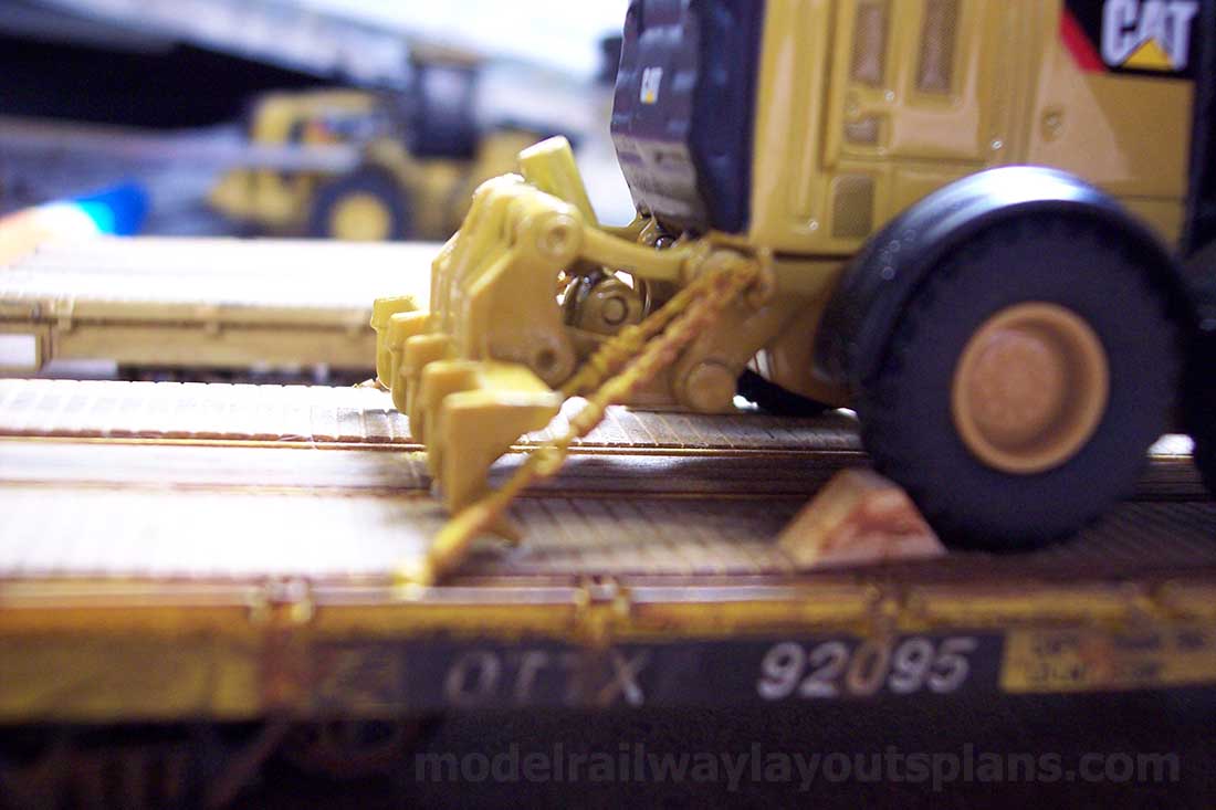model train yard flatbed freight in train yard